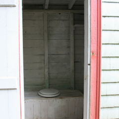Outhouse, Memory Lane Heritage Village, Museum in Lake Charlotte, Nova Scotia, Canada