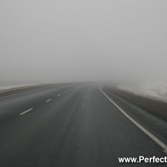 Foggy highway motorway driving conditions; New Brunswick, Canada, North America; Travel;  Winter, fog, poor visibility, danger, dangerous, can't see, caution, white, bright