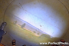 Image on floor, of Camera Obscura, with feet showing, Cheverie,  East Hants, Nova Scotia, Canada