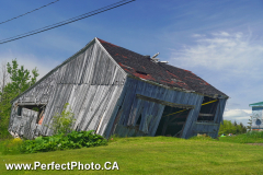 Leaning abandoned building barn,  Walton, Cobequid Bay, Minas Basin, Hants County, Nova Scotia, Canada