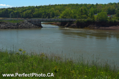 Tidal stream flow under bridge, Walton, Cobequid Bay, Minas Basin, Hants County, Nova Scotia, Canada; Kayaking
