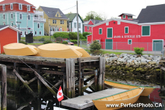 Yellow Dorys at Adams and Kinickle, Lunenburg,Nova Scotia, Canada, North America, Red, building, Dory, dories, color, colour, colourful, colorful