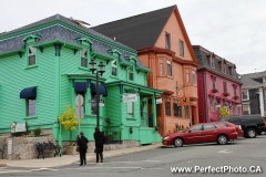 Brightly painted buildings, Lunenburg, South Shore, Nova Scotia, Canada, North America, Color, colour, colorful, colourful, Green, Orange, Red, black, tourism, tourist, tourists
